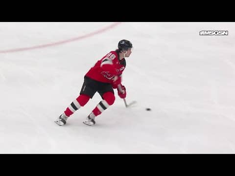 Peyton Krebs scores a goal against the New Jersey Devils