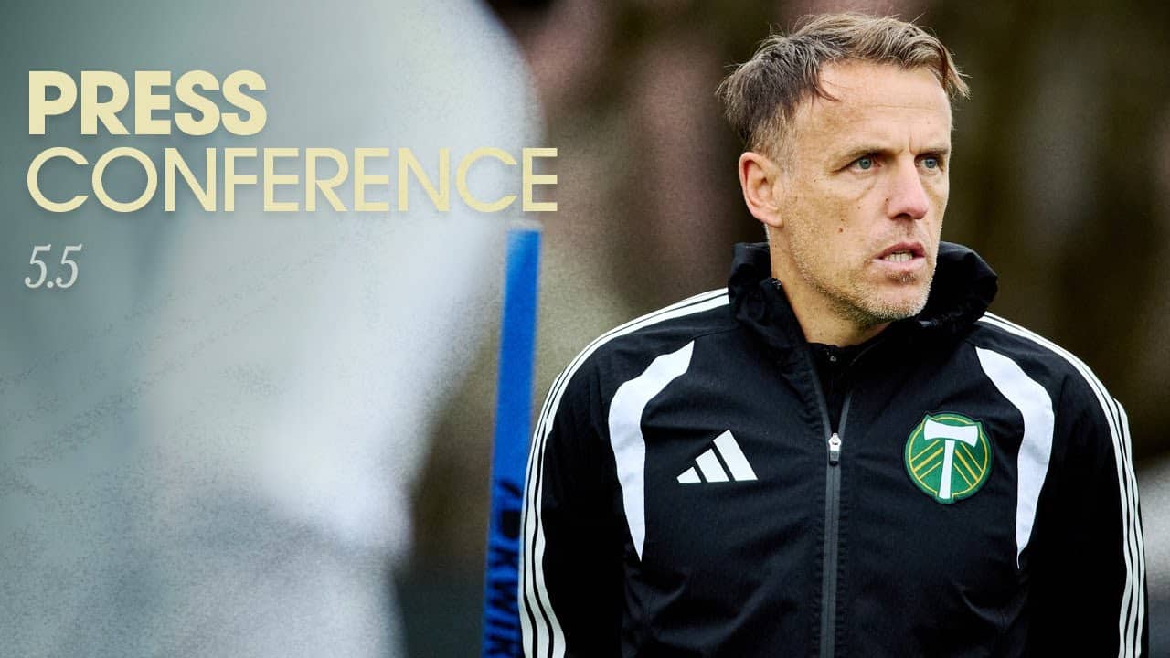 Phil Neville talks to media after midweek training