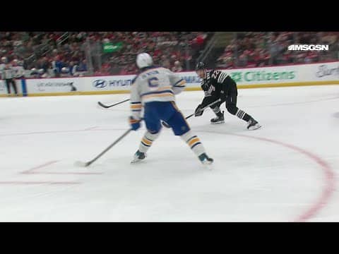 Zach Benson scores a goal against the New Jersey Devils