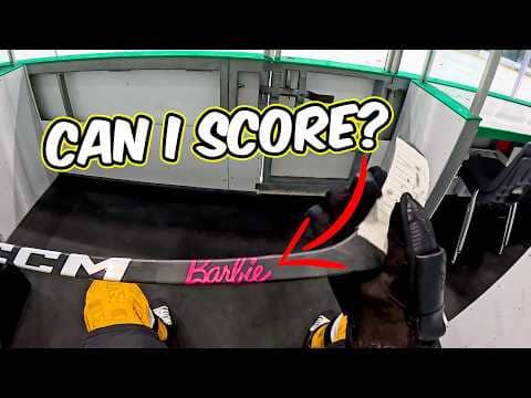 Trying to Score with a Barbie Hockey Stick