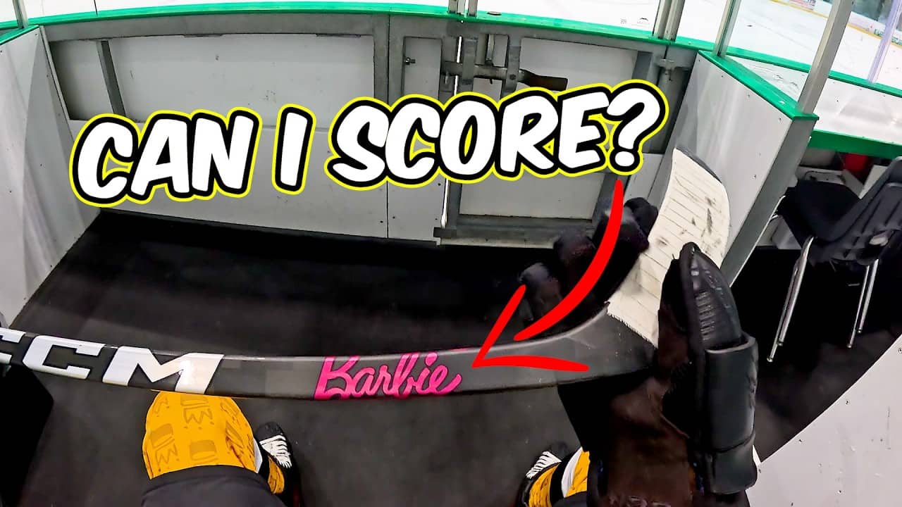 Trying to Score with a Barbie Hockey Stick