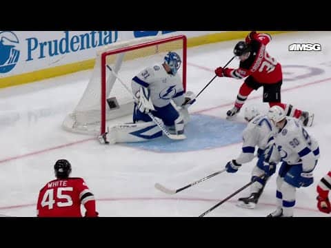 Angus Crookshank scores a goal against the Tampa Bay Lightning