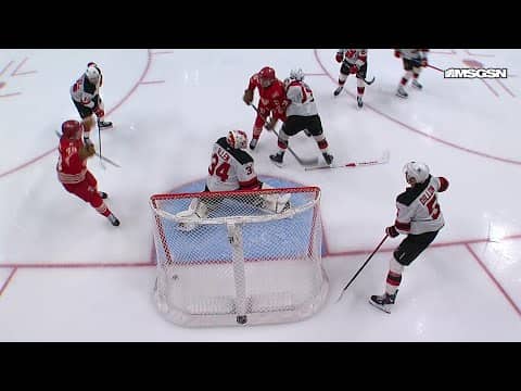 Emmitt Finnie scores a goal against the New Jersey Devils