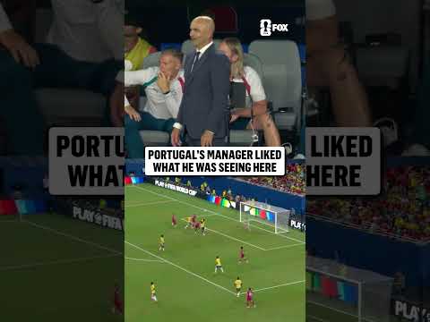 Roberto Martínez applauds his team after the attacking chance