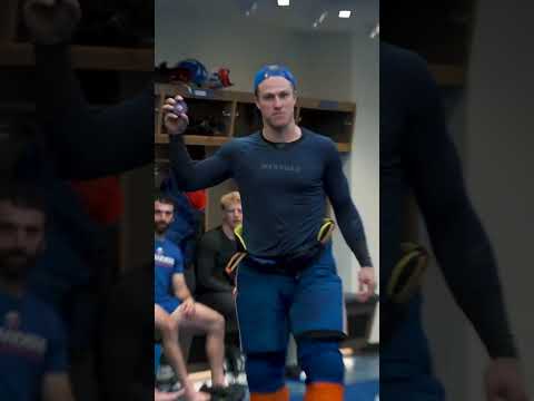 New York Islanders Captain Anders Lee Gives Game Puck To General Manager Mathieu Darche
