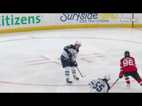 Mark Scheifele scores a goal against the New Jersey Devils