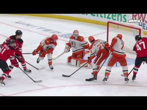 Paul Cotter scores a goal against the Anaheim Ducks