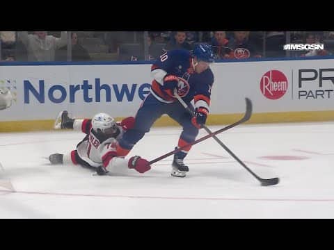 Simon Holmstrom scores a goal against the New Jersey Devils