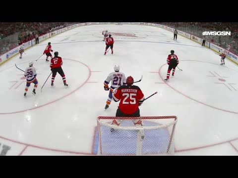 Kyle Palmieri scores a goal against the New Jersey Devils