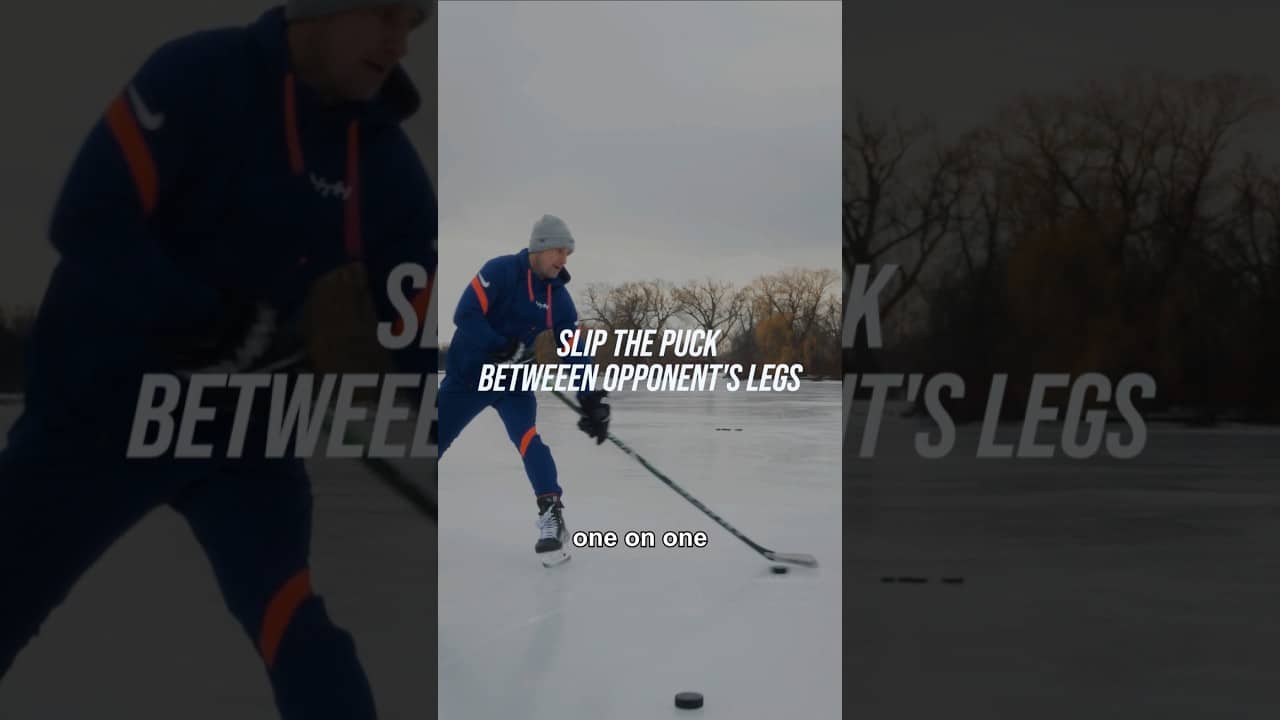 SLIP THE PUCK BETWEEN OPPONENT'S LEGS