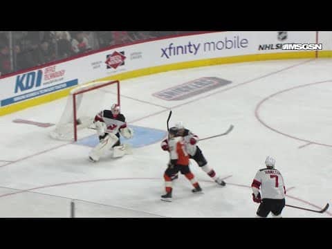 Bobby Brink scores a goal against the New Jersey Devils