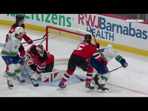 Jake DeBrusk scores a powerplay goal against the New Jersey Devils