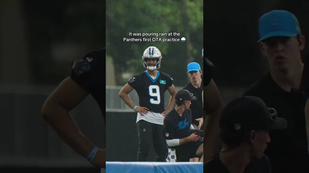 POURING rain at Panthers OTAs 🌧️ (via @panthers/TT)