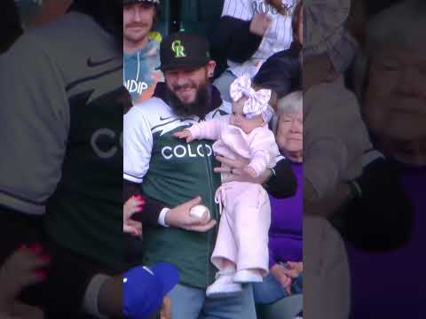 Fan catch of the year?! This guy caught a foul ball while holding a baby 🤯