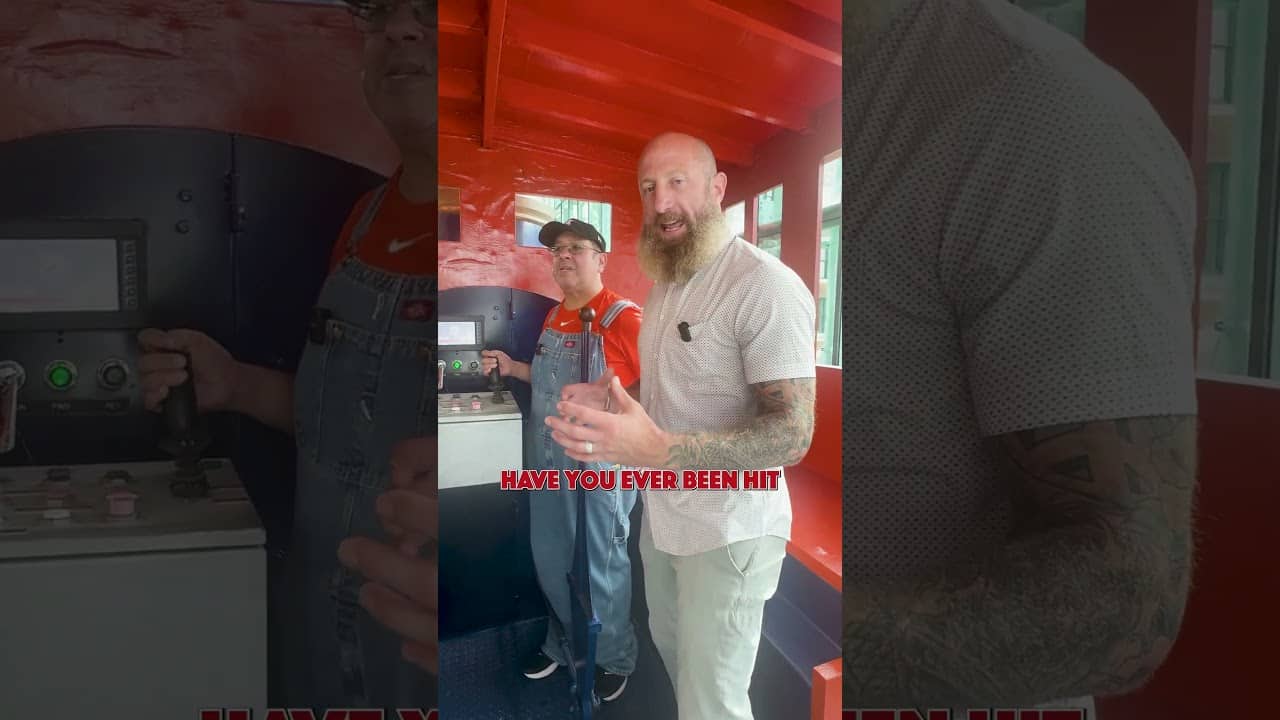 Dallas chops it up with the conductor of the Astros train, Bobby Dynamite 🚂