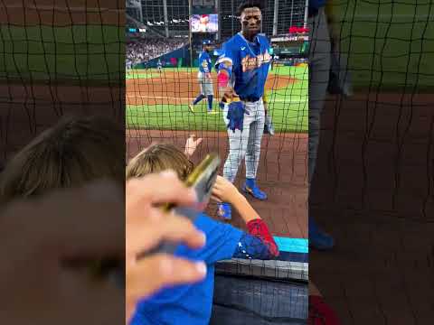 Ronald Acuña Jr. gifts a young fan his batting glove 😍🤗