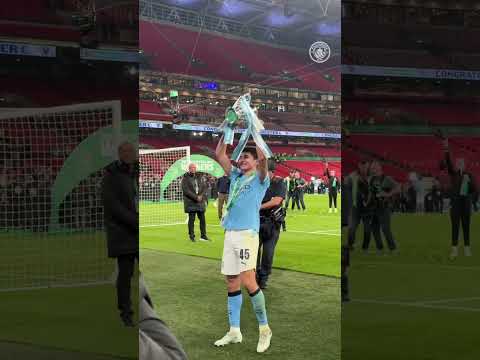 Khusanov celebrates with the Carabao Cup trophy! 🇺🇿