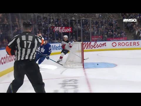 Matthew Knies scores a goal against the New Jersey Devils