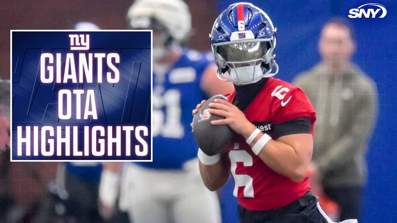 Jaxson Dart, Kayvon Thibodeaux, and John Harbaugh on the field for Giants OTA workout