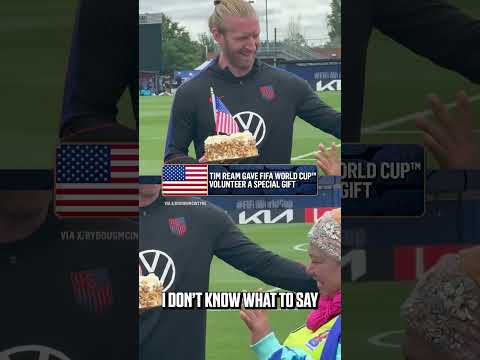 A special moment of appreciation between Tim Ream and FIFA World Cup volunteer Vera Gonzales Howard