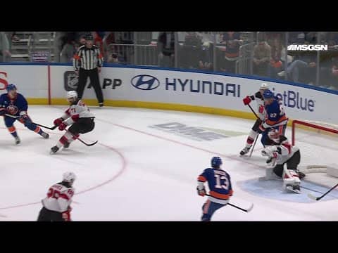 Adam Pelech scores a goal against the New Jersey Devils