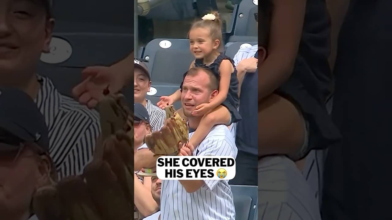 This young fan covered her dad’s eyes as someone threw him a baseball … somehow he caught it 😮