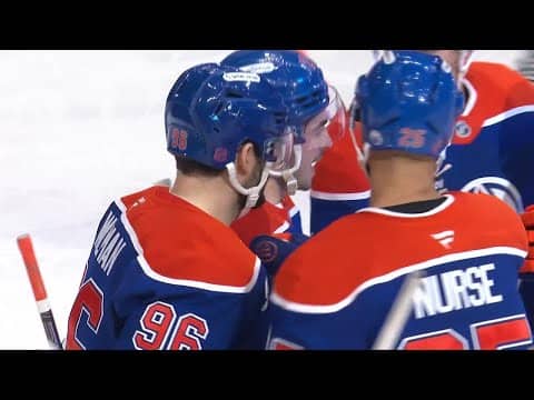 Matt Savoie scores a goal against the New Jersey Devils