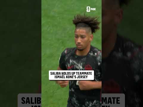 After scoring for Canada, Nathan Saliba held up Ismaël Koné's jersey