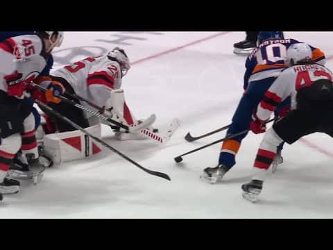 Simon Holmstrom scores a goal against the New Jersey Devils