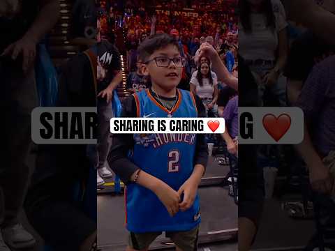 Young fan gives another young fan his T-shirt from the T-shirt toss ❤️