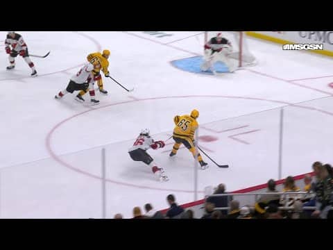 Erik Karlsson scores a goal against the New Jersey Devils