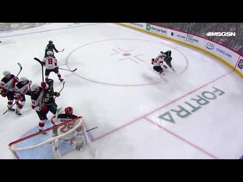 Ryan Hartman scores a goal against the New Jersey Devils