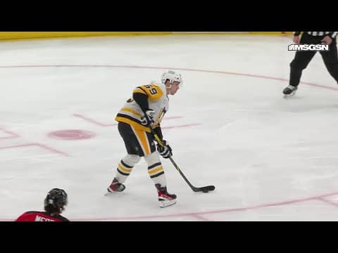 Bryan Rust scores a goal against the New Jersey Devils