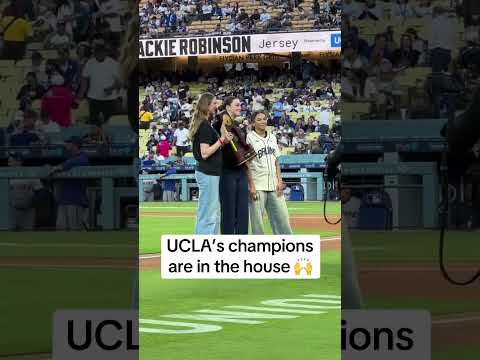 Amanda Muse, Angela Dugalic, and Kiki Rice holding the natty trophy at the Dodgers game 🔥