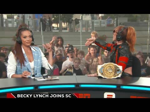 Becky Lynch chirps at fan after they chanted 'AJ Lee' during her interview | SportsCenter
