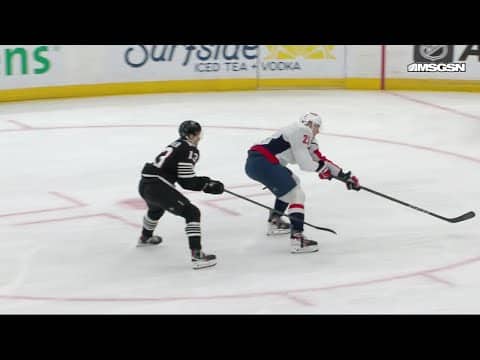 Dylan Strome scores a goal against the New Jersey Devils