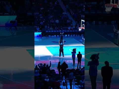 Hornets fan sinks a half court shot and then shows off his Dell Curry jersey!