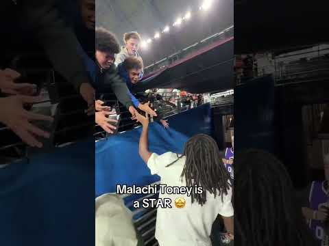 Malachi Toney with fans after the W 🏈