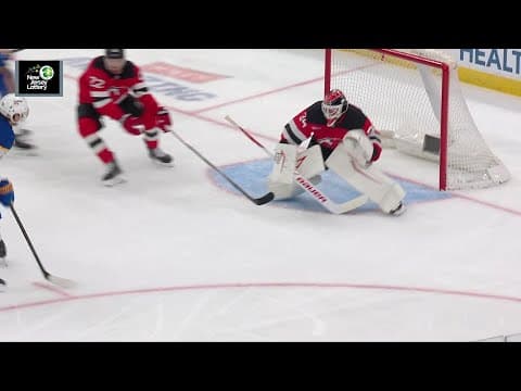 Tage Thompson scores a goal against the New Jersey Devils