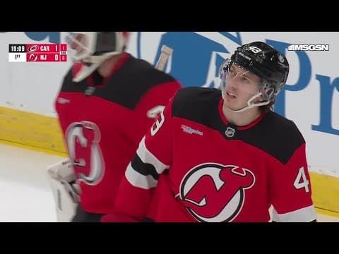 Nikolaj Ehlers scores a goal against the New Jersey Devils