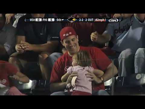 Dad makes tough catch, but daughter tosses ball back