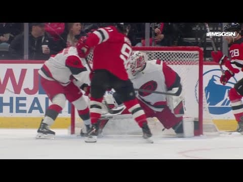 Dawson Mercer scores a goal against the Carolina Hurricanes
