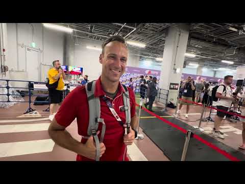 Kyle Rutledge of Pittsburgh State talks after coaching Cordell Tinch to men’s 110h world title