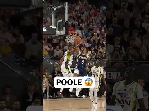 Jordan Poole hangs in the air for the TOUGH reverse finish!