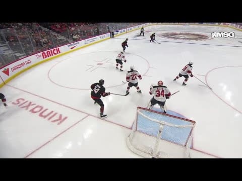 Dylan Cozens scores a powerplay goal against the New Jersey Devils