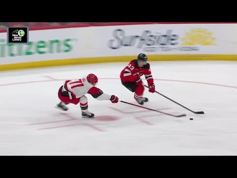 Taylor Hall scores a goal against the New Jersey Devils