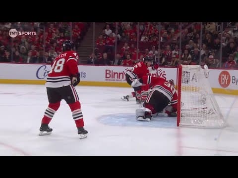 Dawson Mercer scores a goal against the Chicago Blackhawks