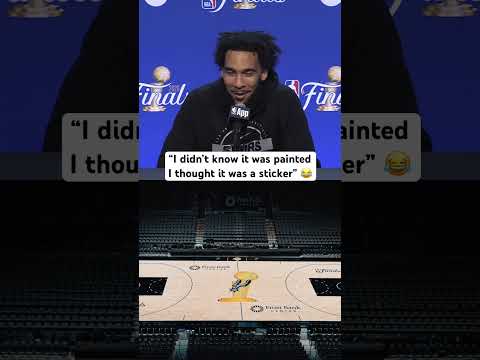 Julian Champagnie talks about the NBA Finals trophy on the court