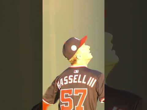 Robert Hassell III reaches over the center field wall to bring back a homer! 🤯