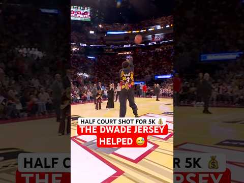 Fan hits a half court shot for 5K!